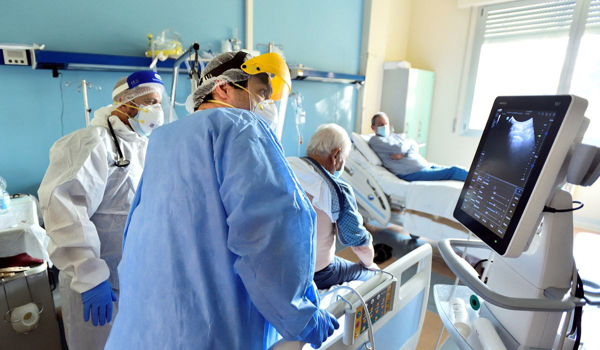 Doctor treat a patient suffering with the coronavirus disease